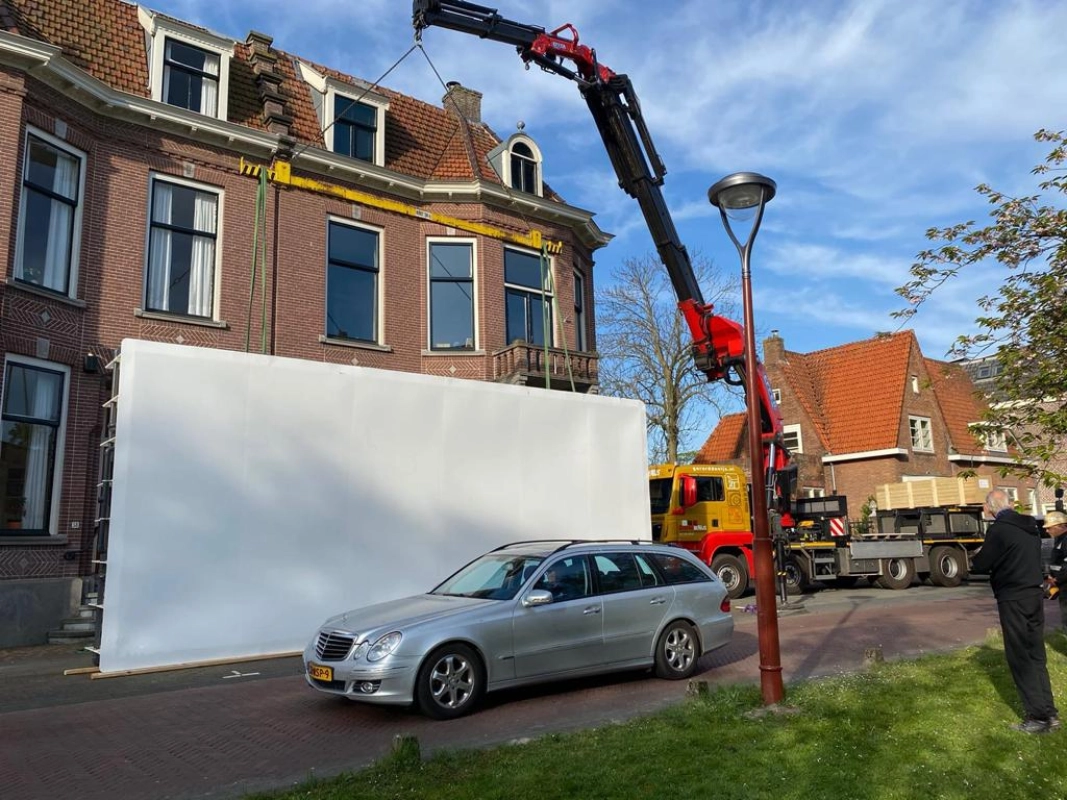 Boom uit tuin hijsen